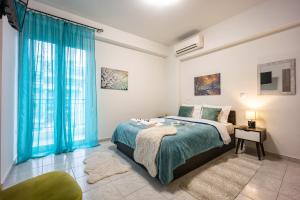 Ένα ή περισσότερα κρεβάτια σε δωμάτιο στο Athens Luxury with Amazing View