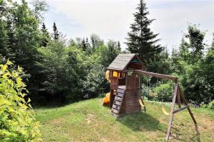 Jardí fora de Le Belvédère - Chalet avec vue splendide sur le fleuve