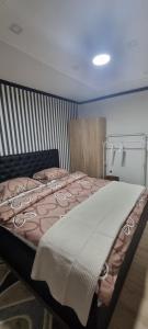 Letto o letti in una camera di CENTRaL FLaT