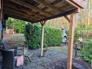 BenB Op de Vleet vrijstaande accommodatie外面的花园
