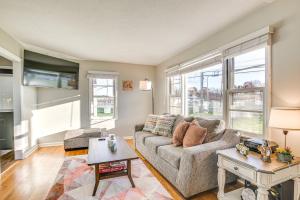 a living room with a couch and a table at 16 Mi to Buckeye Lake Family-Friendly Newark Home in Newark