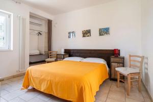 Postel nebo postele na pokoji v ubytování B&B Quattrolinari