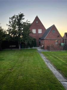 Κήπος έξω από το Ferienhaus nahe der Nordsee, in Loquard, nahe Greetsiel und Emden +11 φωτογραφίες