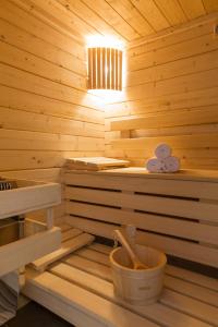 a wooden sauna with a light on top of it at Hôtel 96 in Marseille
