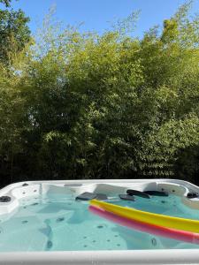 a boat with a rainbow paddle in at San Biagio in San Lorenzo Nuovo