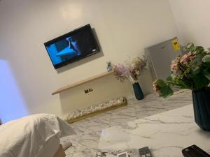 Televisyen dan/atau pusat hiburan di Hotel Spintex