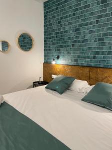 Postel nebo postele na pokoji v ubytování HOTEL ORENETA - Gironella