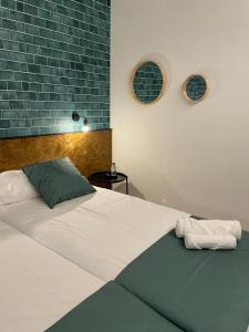 Postel nebo postele na pokoji v ubytování HOTEL ORENETA - Gironella