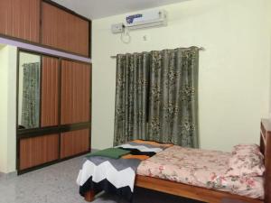 Vian Homestay客房内的一张或多张床位