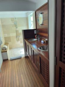 Un ou plusieurs lits dans un hébergement de l'établissement Villa BOT- EVERSAIL avec vue panoramique sur l'océan