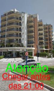 a picture of a parking lot with some buildings at BARRAVENTO RESIDENCE - RIVIERA SÃO LOURENçO in Bertioga
