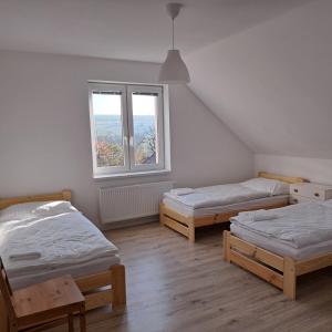 Postel nebo postele na pokoji v ubytování Apartmán Stará Myjava