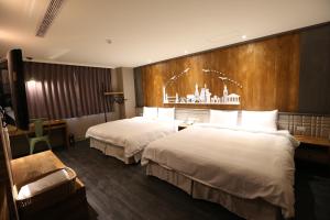מיטה או מיטות בחדר ב-Central Hotel