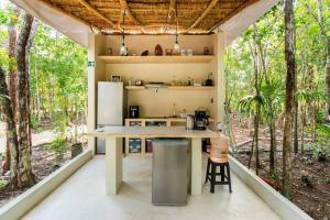 Kuchyň nebo kuchyňský kout v ubytování Glamping Mayan Glam