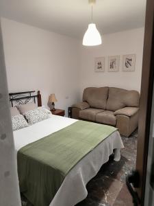 Posteľ alebo postele v izbe v ubytovaní lugar de seixalvo balcón