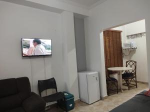 TV a/nebo společenská místnost v ubytování Eduarda + 3 fotografie
