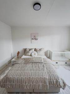 Postel nebo postele na pokoji v ubytování apartmán Sirka Sušice