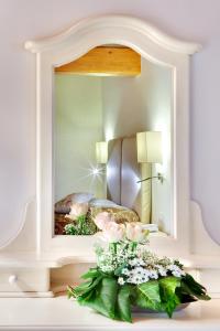 A bed or beds in a room at Agriturismo Ca' Beatrice - Venice Airport