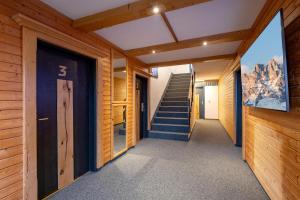 a hallway of a house with stairs and a mountain at Mountainresort Seiwald in Prama