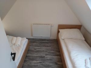 Postel nebo postele na pokoji v ubytování NRV Appartement Top 8