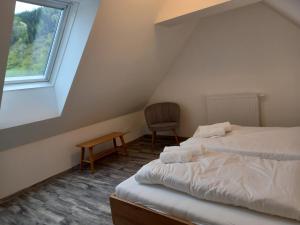 Postel nebo postele na pokoji v ubytování NRV Appartement Top 8