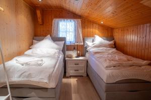 Postel nebo postele na pokoji v ubytování Chalet Santa Maria