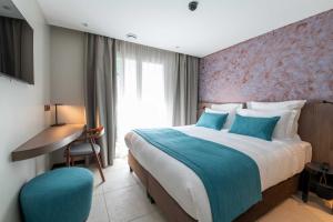 Sable Bleu Boutique Hotel客房内的一张或多张床位