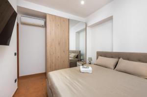 Postel nebo postele na pokoji v ubytování Tranquillity Suite Apartment