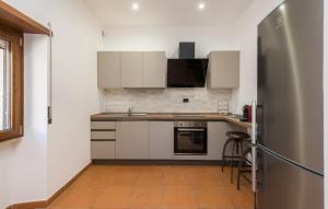 Kuchyň nebo kuchyňský kout v ubytování Tranquillity Suite Apartment
