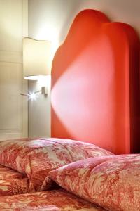 A bed or beds in a room at Agriturismo Ca' Beatrice - Venice Airport