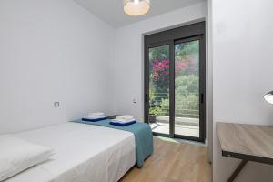 Posteľ alebo postele v izbe v ubytovaní Villa Darazzo with Private Pool