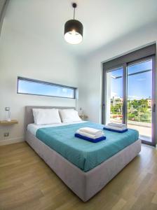 Posteľ alebo postele v izbe v ubytovaní Villa Darazzo with Private Pool