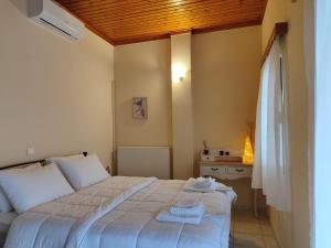 Postel nebo postele na pokoji v ubytování Sea View House