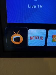 a cell phone screen with the netflix and apple logos at Freundliches City-Apartment mit Balkon & Skyline-Blick - Easy Stay Wuppertal in Wuppertal
