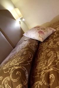 A bed or beds in a room at Agriturismo Ca' Beatrice - Venice Airport