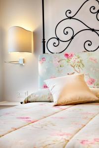 A bed or beds in a room at Agriturismo Ca' Beatrice - Venice Airport