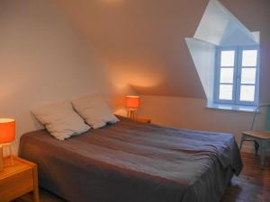 Posteľ alebo postele v izbe v ubytovaní Villa contemporaine avec vue mer à Sauzon - FR-1-418-201