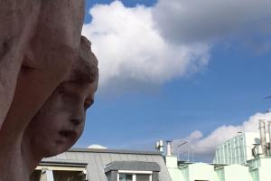 a statue of a head in front of a building at Sophie's Place Augarten - Lifestyle City Apartments Vienna Parking in Vienna