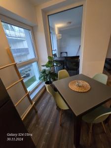 a dining room with a table and chairs at IaM Attendorn 4 Betten 60 Qm Neu Modernisiert in Attendorn