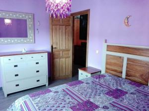 A bed or beds in a room at Nature Love