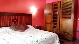 A bed or beds in a room at Nature Love