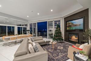 a living room with a christmas tree in it at Piermont Waterfront Villa! in Piermont