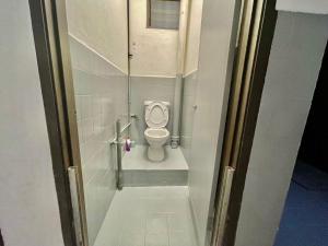 a small bathroom with a toilet in a stall at Home41#6pax#netflix#NearIconCity&AeonAlma in Bukit Mertajam +34 photos