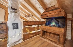 a large wooden room with a fish tank in a room at Gorgeous Home In Harzgerode With Wifi in Harzgerode