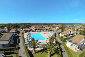 an aerial view of a resort with a swimming pool at Villa in Cecina Mare near Sandy Beaches in Marina di Cecina +14 photos