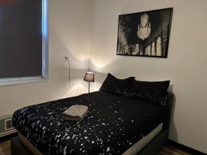 Postel nebo postele na pokoji v ubytování Queen Nest Hotel