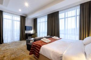 Postel nebo postele na pokoji v ubytování Citrus Hotel