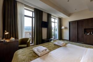 Postel nebo postele na pokoji v ubytování Citrus Hotel