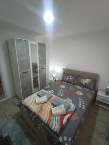 Postel nebo postele na pokoji v ubytování Apartman Hs