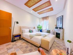 En eller flere senge i et værelse på Downtown Gem - Central Rabat apartment in a 1910 Building